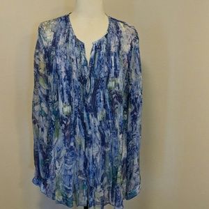 Sheer dressy blouse in blue's, flared at bottom